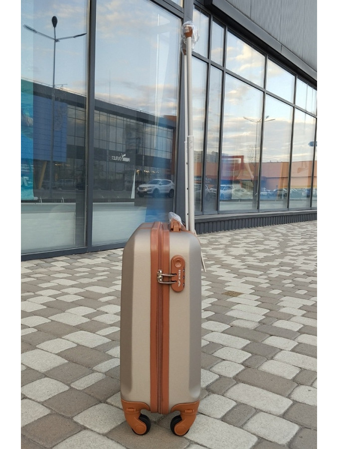 Чемодан пластиковый Wings GDW01 шампань XS